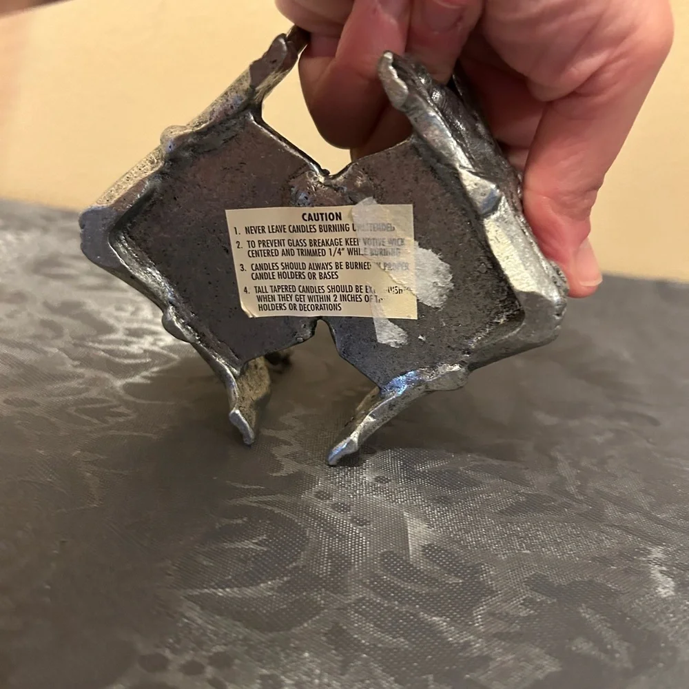 Pewter candle holder features hummingbirds and hearts